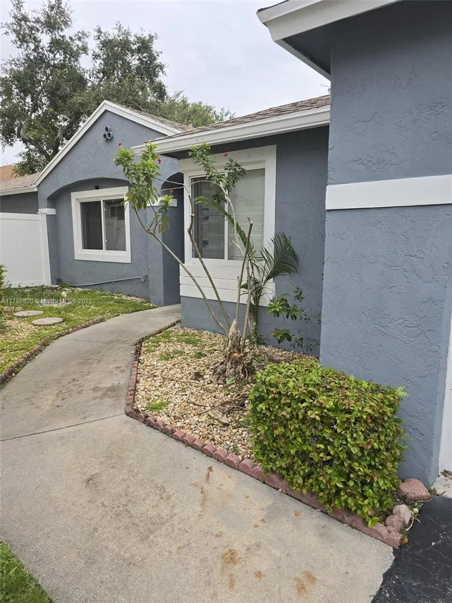 South Florida Real Estate | View 11751 NW 12th St | 3 Beds, 2 Baths