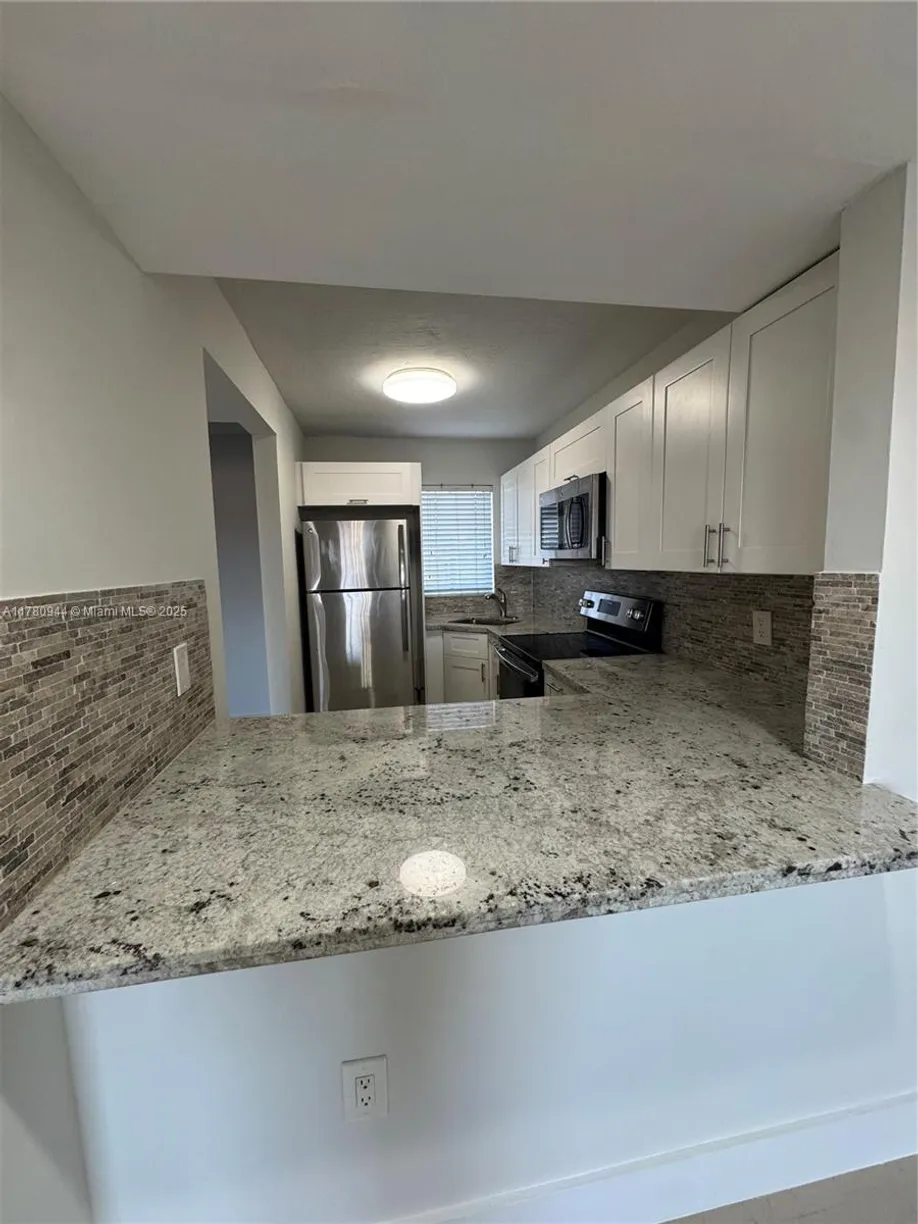 South Florida Real Estate | View 2620 W 76th St, 211 | Listing