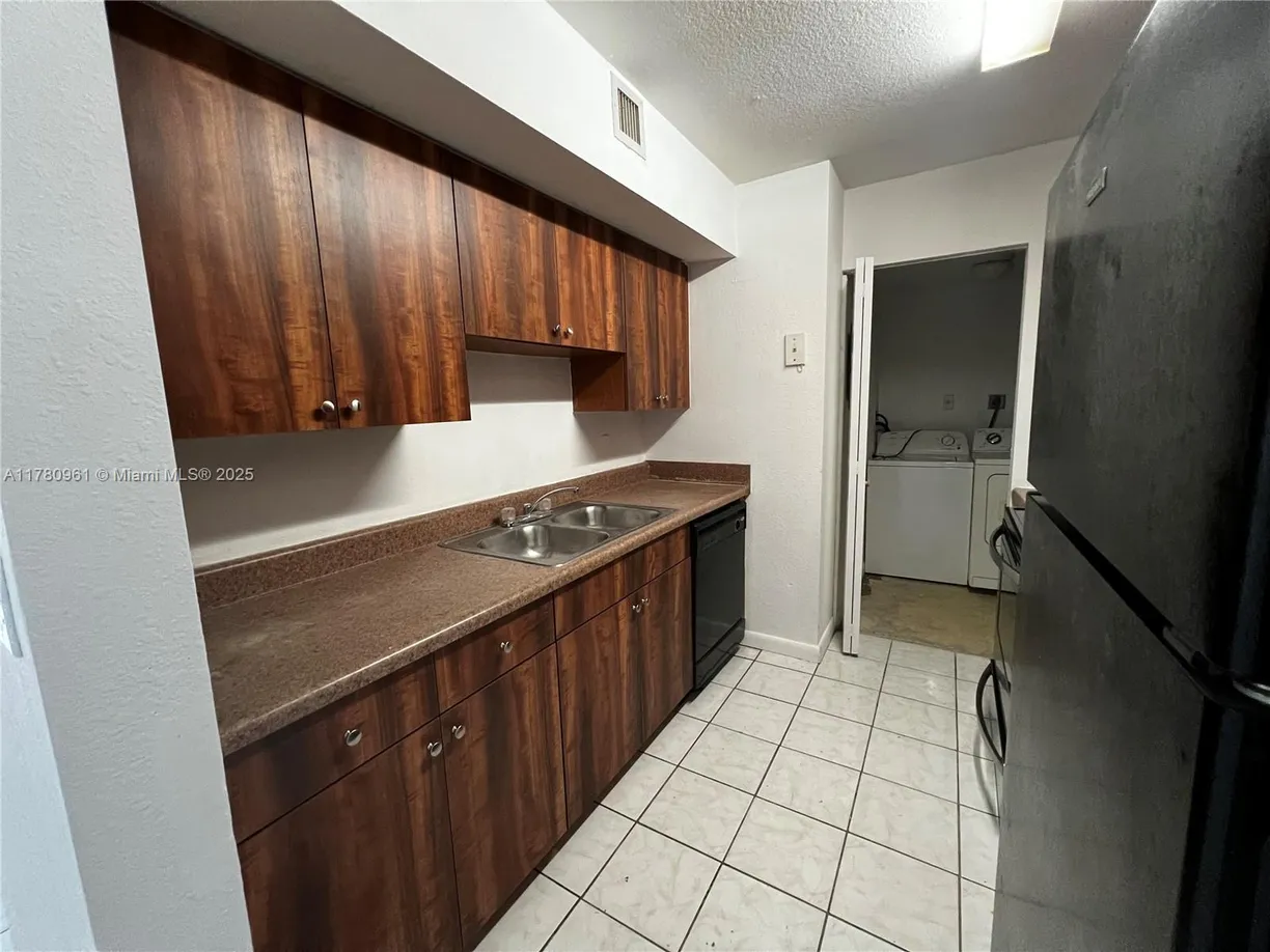 South Florida Real Estate | View 2844 NW 55th Ave, 1B | Listing