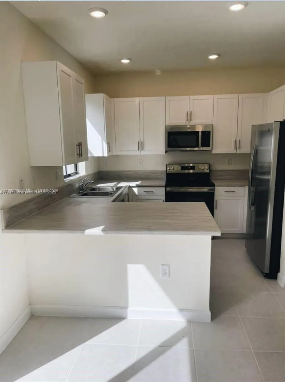 South Florida Real Estate | View 3318 W 112th St | Listing