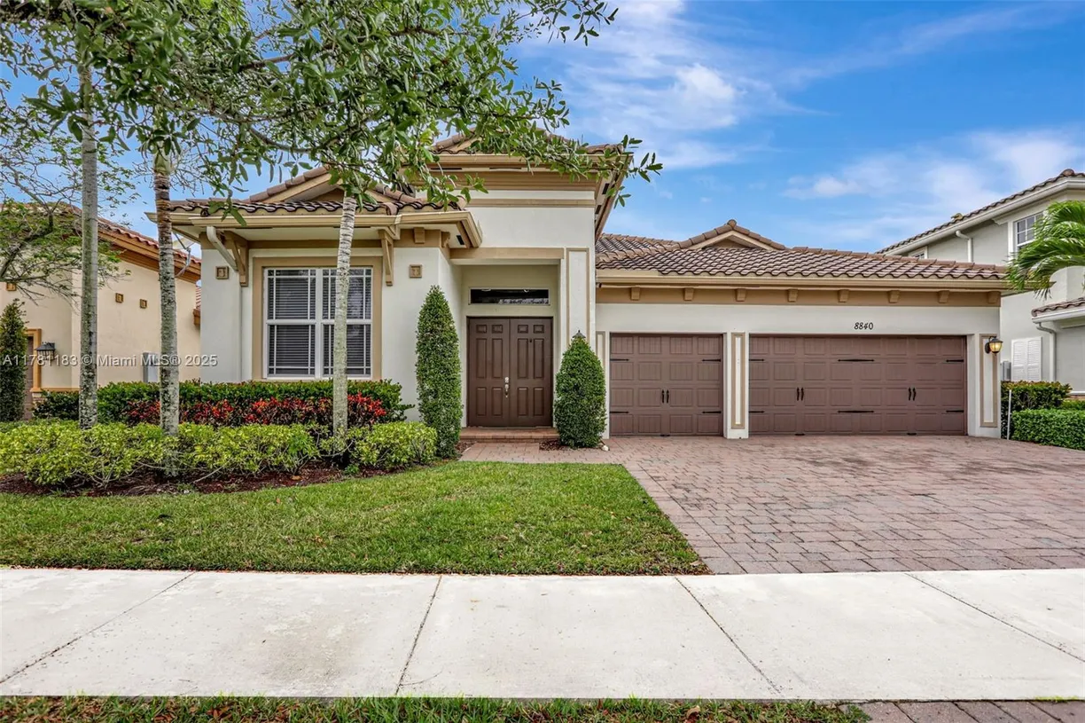 South Florida Real Estate | View 8840 Miralago Way | 5 Beds, 4 Baths
