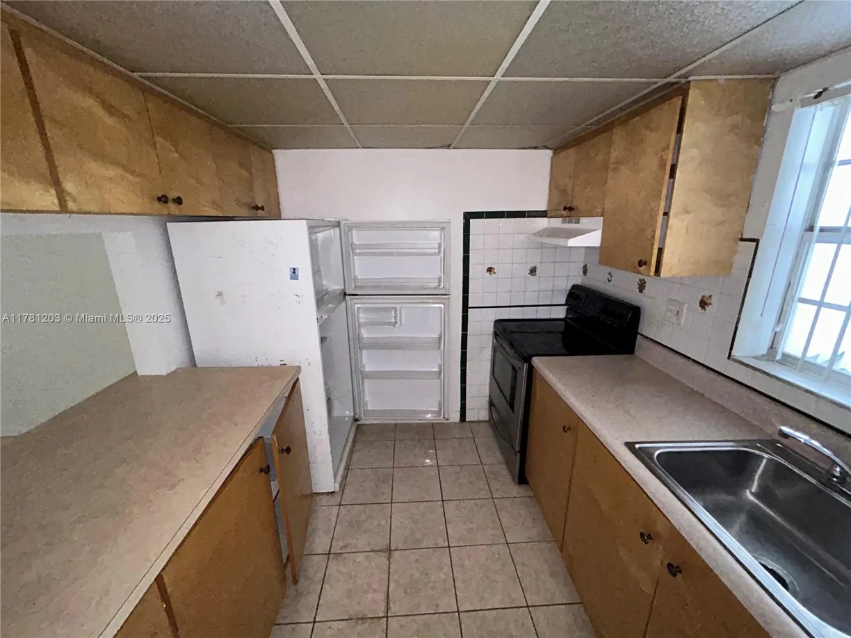 South Florida Real Estate | View 6503 Winfield Blvd, 103-D | 1 Bed, 1 Bath