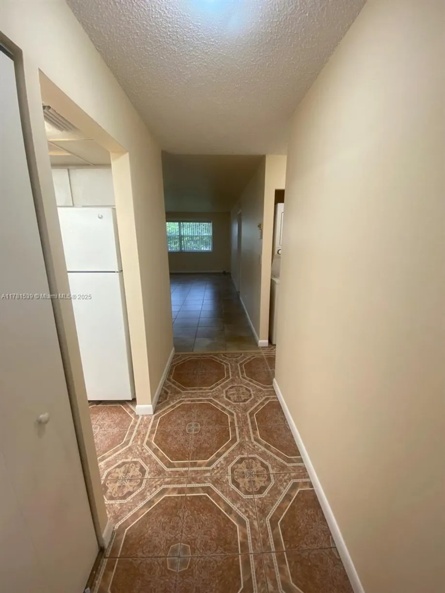 South Florida Real Estate | View 6890 Royal Palm Blvd, 305H | Listing