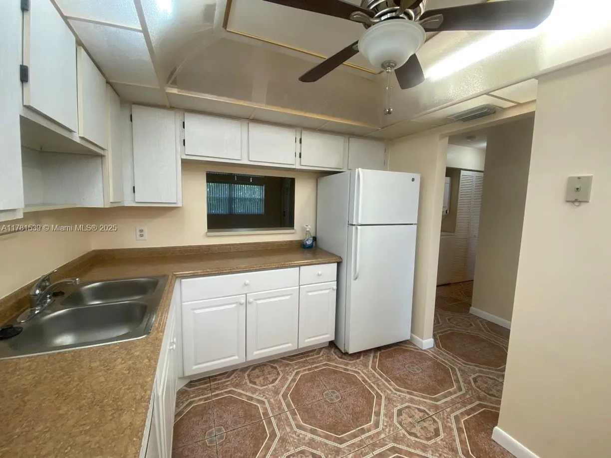 South Florida Real Estate | View 6890 Royal Palm Blvd, 305H | 2 Beds, 2 Baths