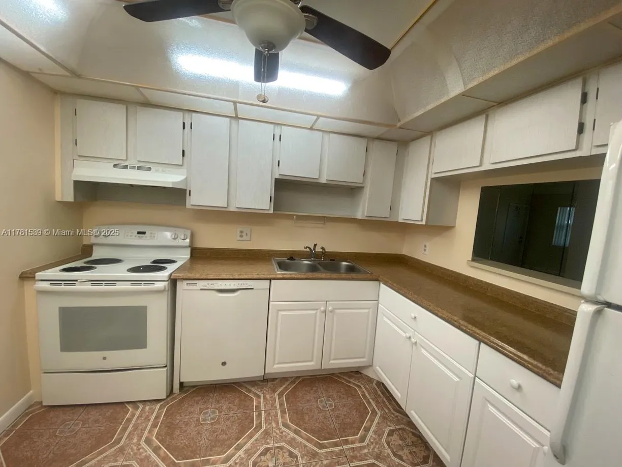 South Florida Real Estate | View 6890 Royal Palm Blvd, 305H | Listing