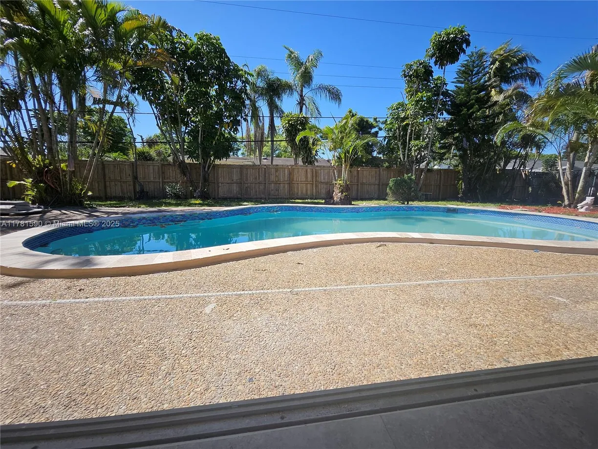 South Florida Real Estate | View 11761 NW 27th Ct | 4 Beds, 3 Baths