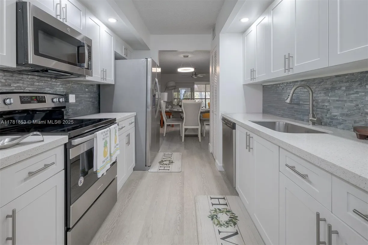 South Florida Real Estate | View 1200 SW 137th Ave, 210E | Listing