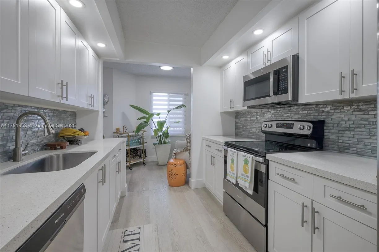South Florida Real Estate | View 1200 SW 137th Ave, 210E | 2 Beds, 2 Baths