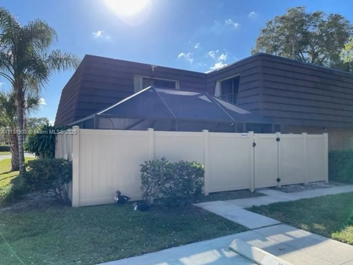 South Florida Real Estate | View 6902 69th Way | 2 Beds, 2 Baths