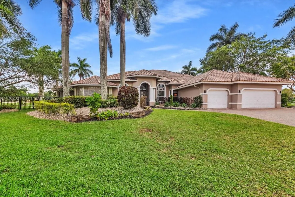 South Florida Real Estate | View 2534 Poinciana Dr | 6 Beds, 6 Baths