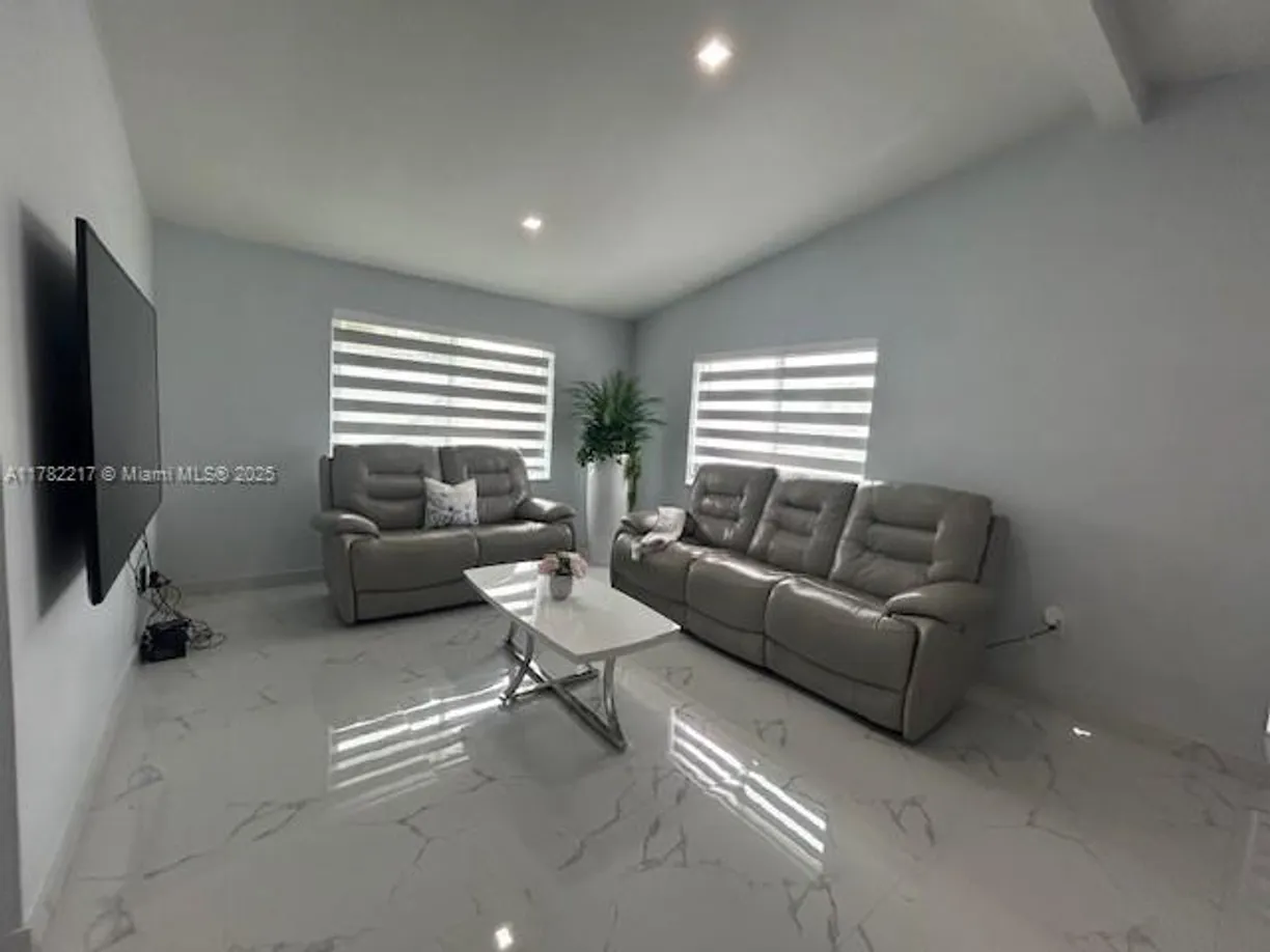 South Florida Real Estate | View 871 SE 4th Pl | Listing