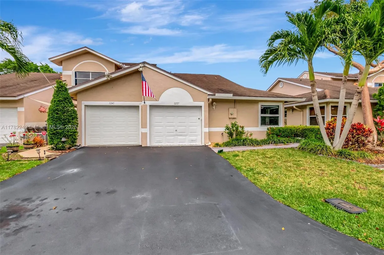 South Florida Real Estate | View 1237 NW 52nd Way | 2 Beds, 2 Baths
