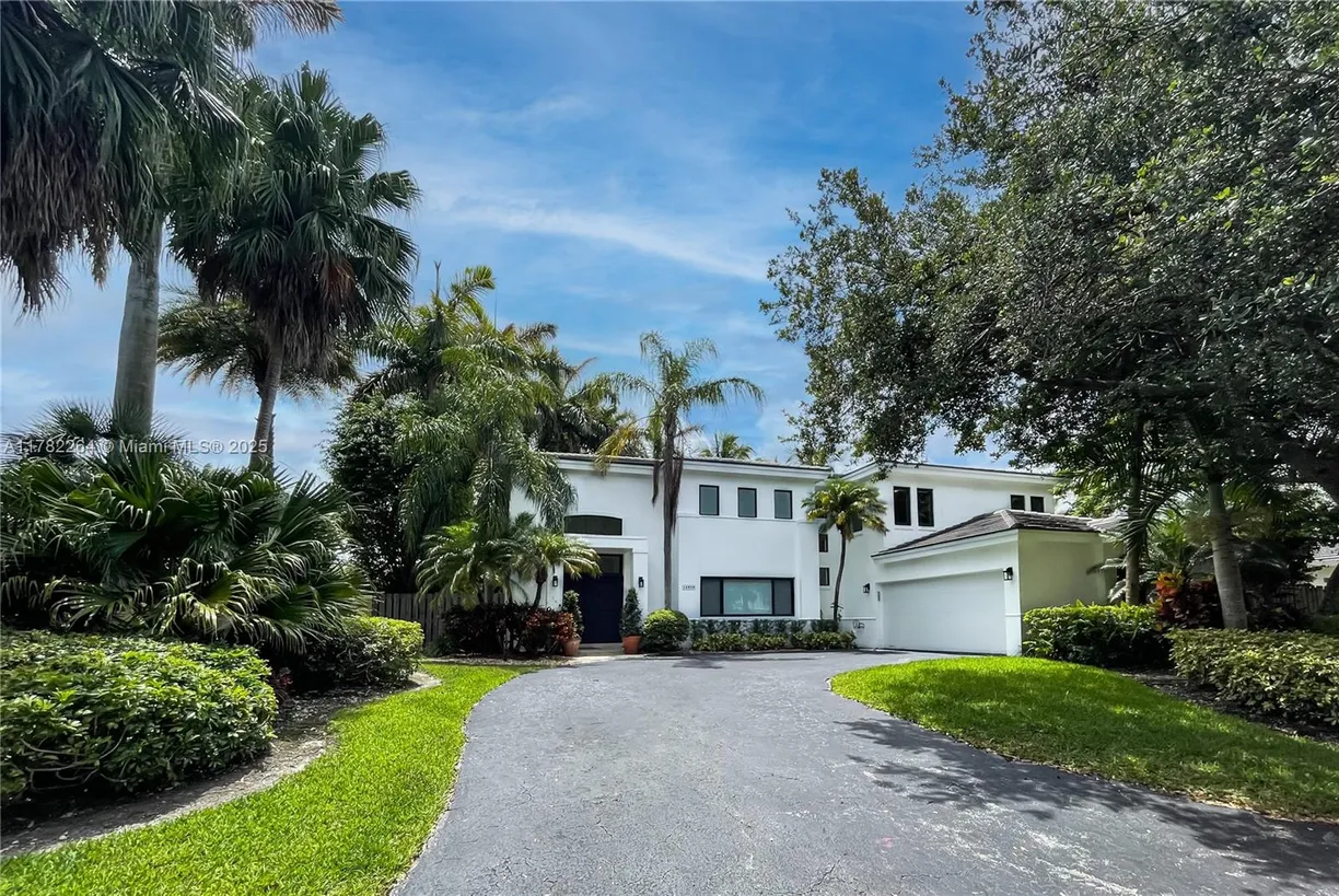 South Florida Real Estate | View 14950 SW 76th Ct | 5 Beds, 3 Baths