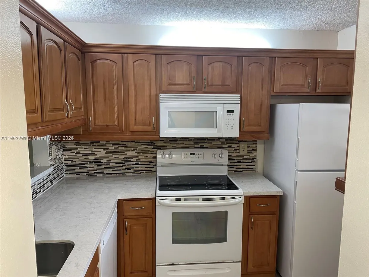 South Florida Real Estate | View 3252 Foxcroft Rd, 206 | Listing