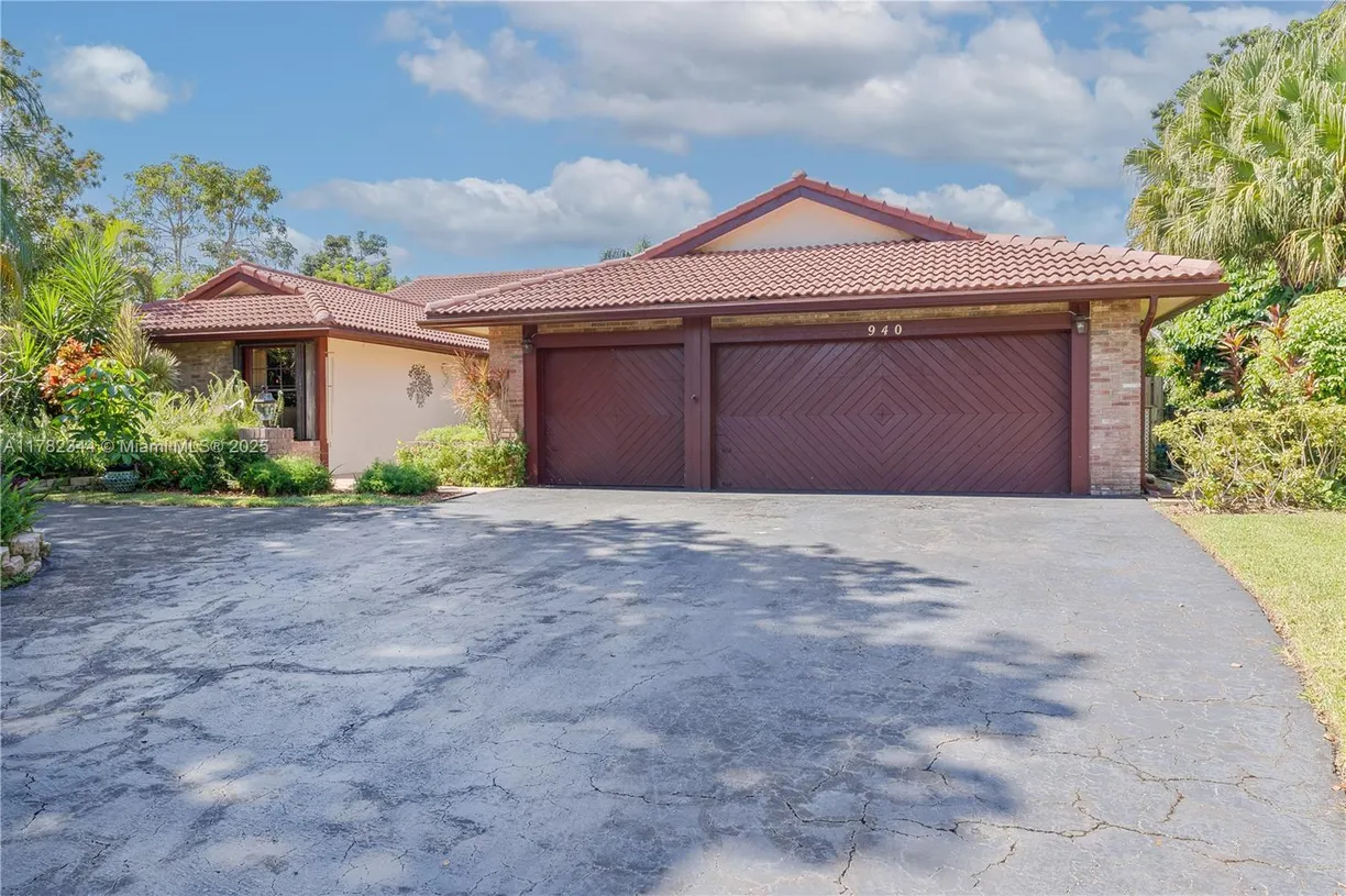 South Florida Real Estate | View 940 NW 110th Ln | 4 Beds, 3 Baths