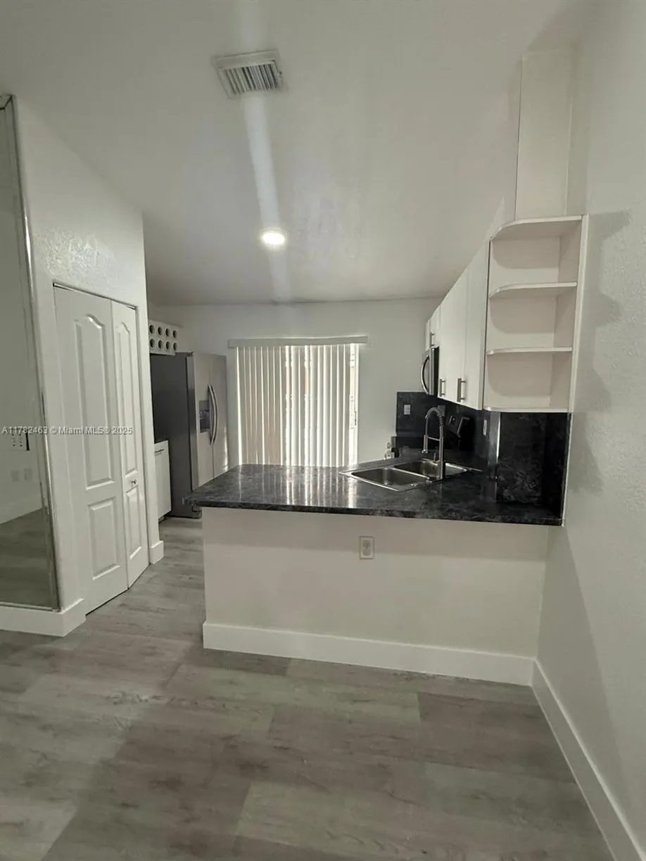 South Florida Real Estate | View 11053 W Okeechobee Rd, 201 | 2 Beds, 2 Baths