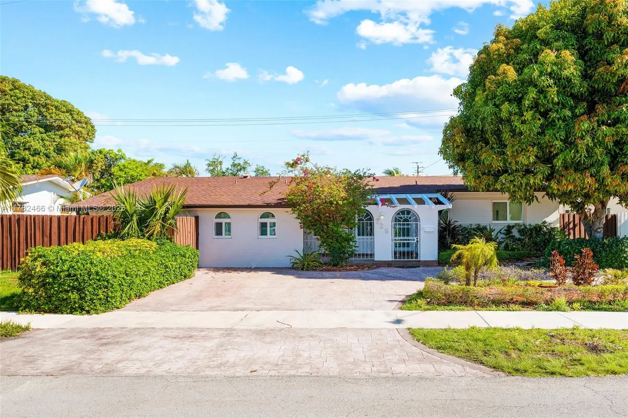 South Florida Real Estate | View 729 W 50th Pl | 4 Beds, 3 Baths