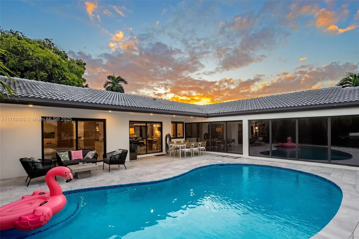 South Florida Real Estate | View 2841 NE 55th St | 4 Beds, 4 Baths