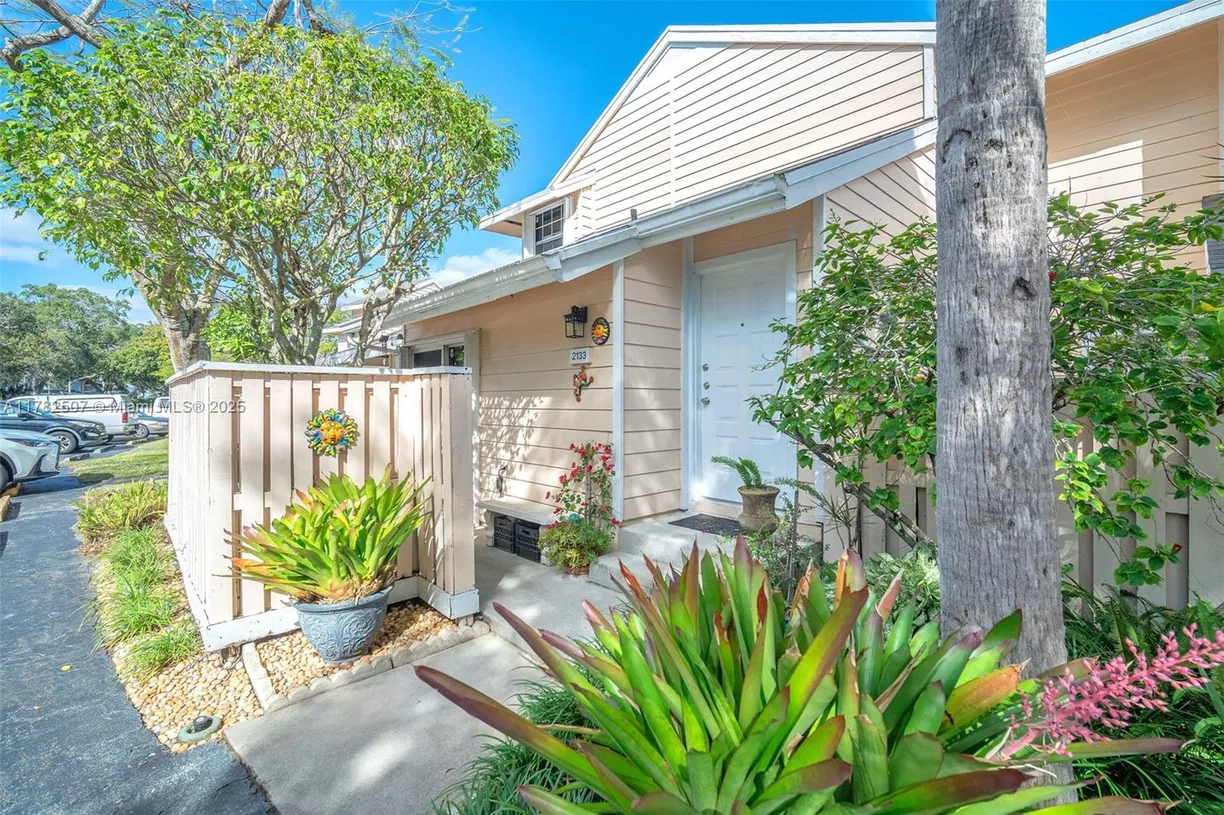 South Florida Real Estate | View 2133 Champions Way | 2 Beds, 2 Baths