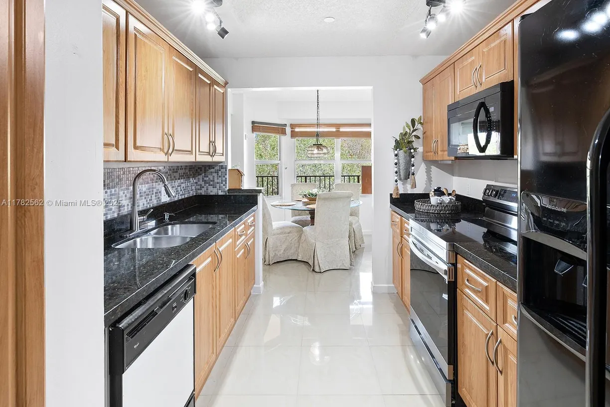 South Florida Real Estate | View 701 SW 141st Ave, 411R | Listing