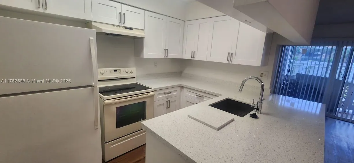 South Florida Real Estate | View 17320 NW 67th Pl, I-7 | 1 Bed, 1 Bath