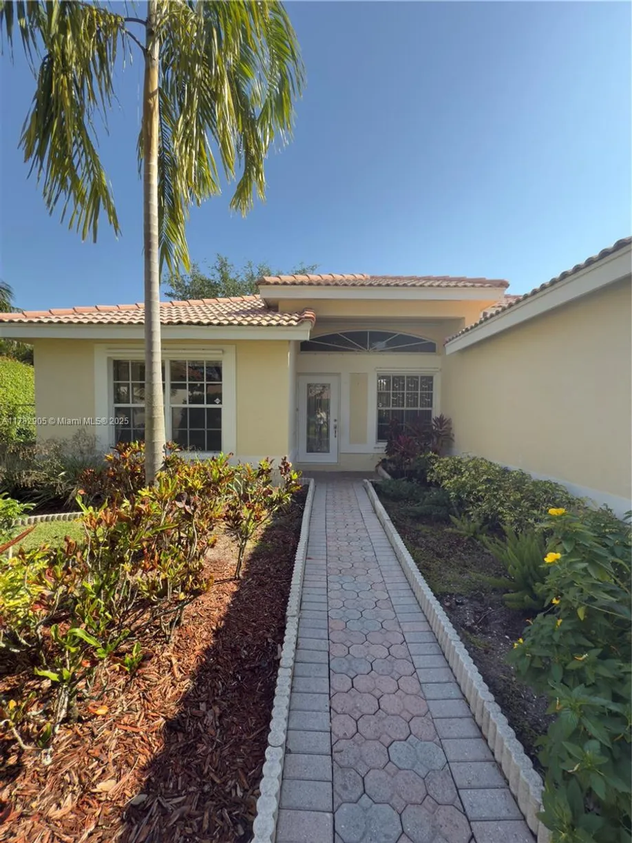 South Florida Real Estate | View 5738 NW 48th Dr | 4 Beds, 2 Baths