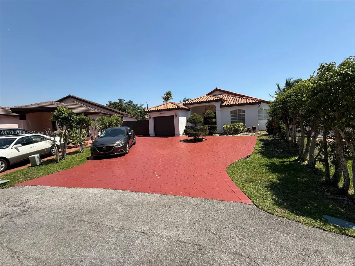 South Florida Real Estate | View 19851 NW 82nd Ct | 3 Beds, 2 Baths
