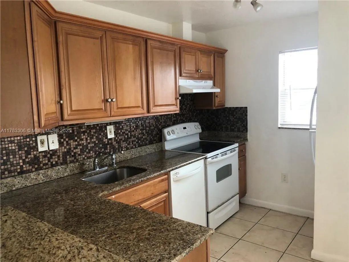 South Florida Real Estate | View 1021 NW 45th St, 4 | 2 Beds, 2 Baths