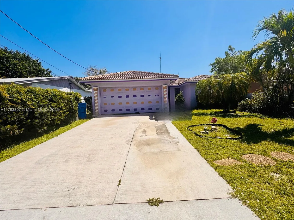 South Florida Real Estate | View 4826 SW 18th St | 3 Beds, 2 Baths
