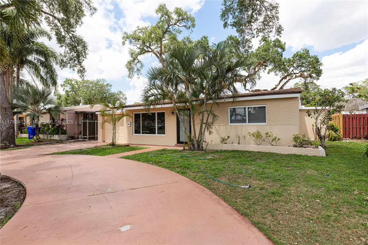 South Florida Real Estate | View 6617 Simms St | 4 Beds, 2 Baths