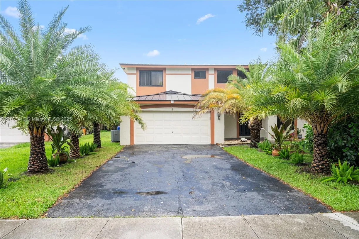 South Florida Real Estate | View 2481 N Riverdale Dr N | 4 Beds, 2 Baths
