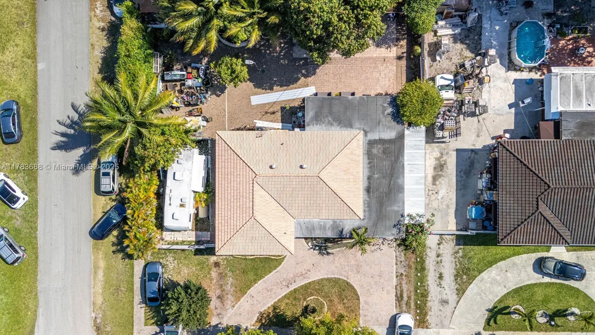South Florida Real Estate | View 210 W 52nd St | 3 Beds, 2 Baths