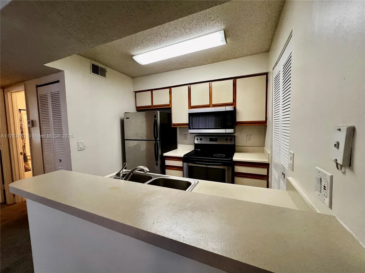 South Florida Real Estate | View 1253 SW 46th Ave, 1602 | Listing