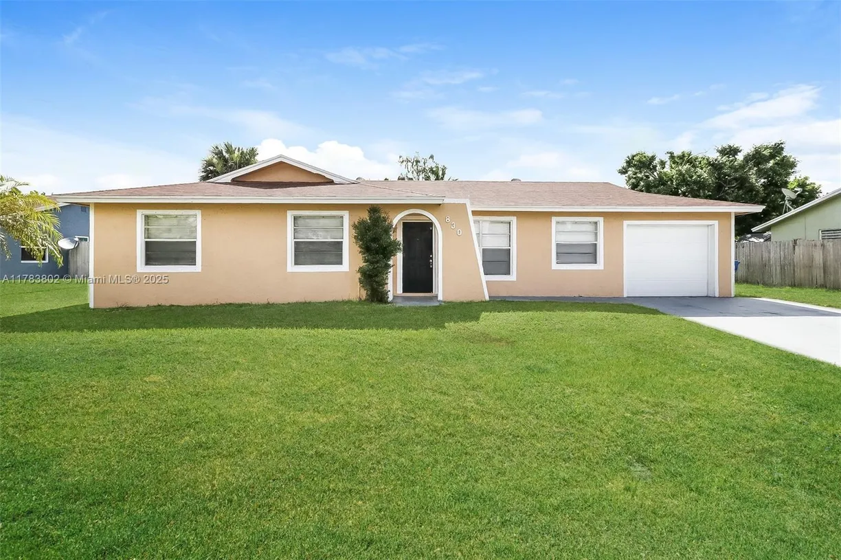South Florida Real Estate | View 830 Royal Palm Beach Blvd | 3 Beds, 2 Baths