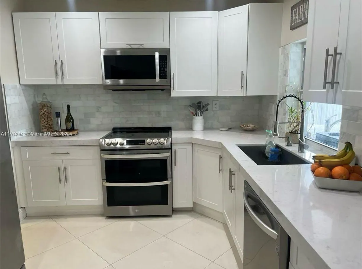 South Florida Real Estate | View 7651 NW 14th St, 7651 | 2 Beds, 1 Bath