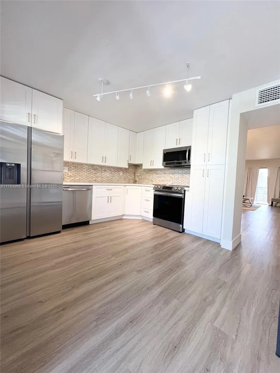 South Florida Real Estate | View 6085 N Sabal Palm Blvd, 308 | Listing