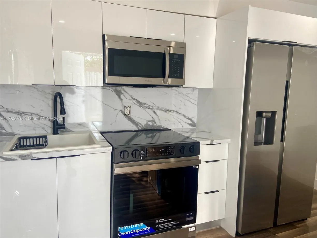 South Florida Real Estate | View 2450 NW 68th St, B | 2 Beds, 1 Bath