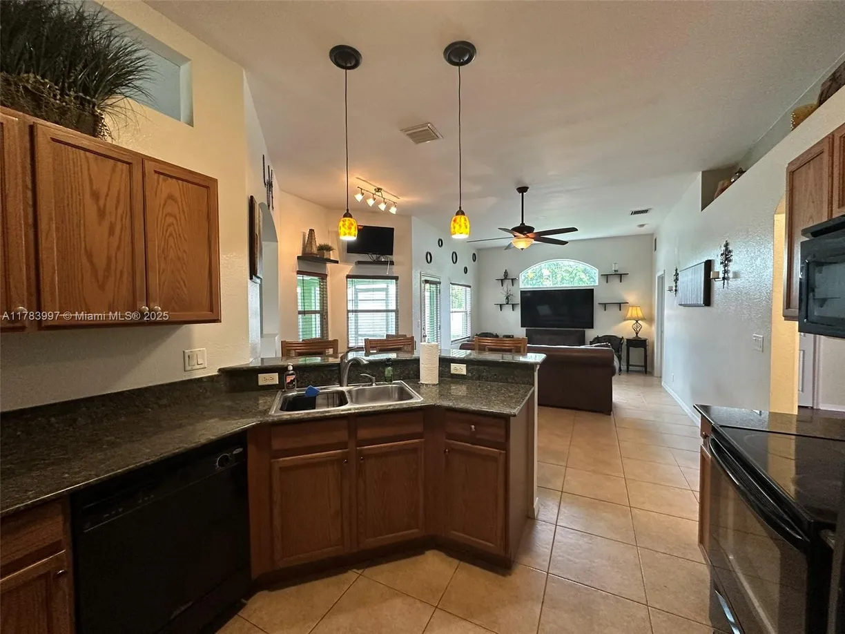 South Florida Real Estate | View 1214 SW Patricia Ave | Listing