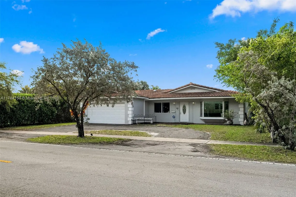 South Florida Real Estate | View 4306 Johnson St | 4 Beds, 2 Baths