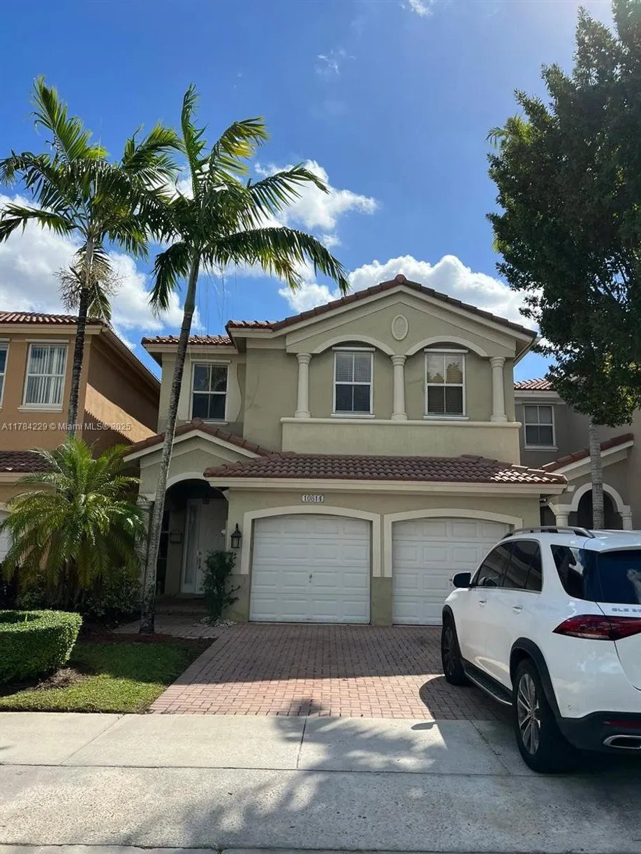 South Florida Real Estate | View 10814 NW 84th Ln | 3 Beds, 2 Baths