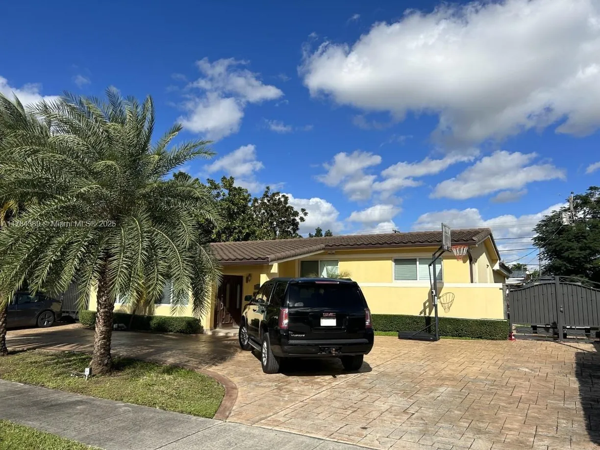 South Florida Real Estate | View 7885 SW 17th St | 3 Beds, 2 Baths