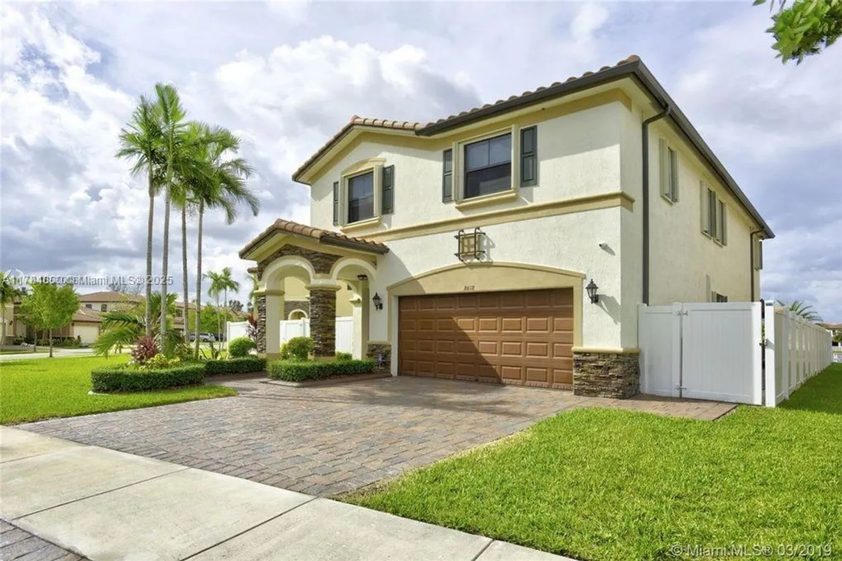 South Florida Real Estate | View 8618 W 33rd Ave | 5 Beds, 4 Baths