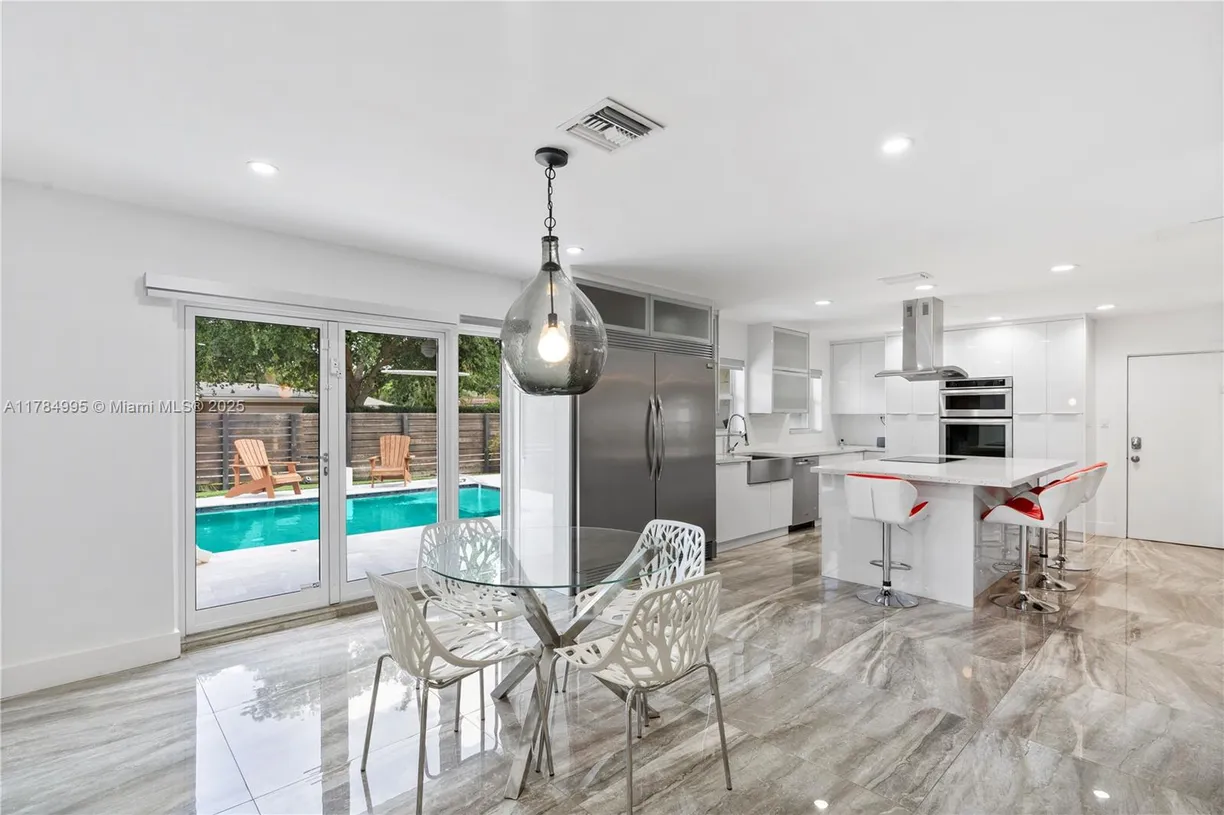 South Florida Real Estate | View 2666 NE 35th Dr | 3 Beds, 2 Baths