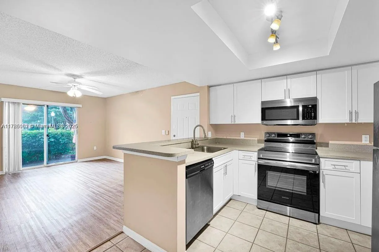 South Florida Real Estate | View 4195 N Haverhill Rd, 302 | 1 Bed, 1 Bath
