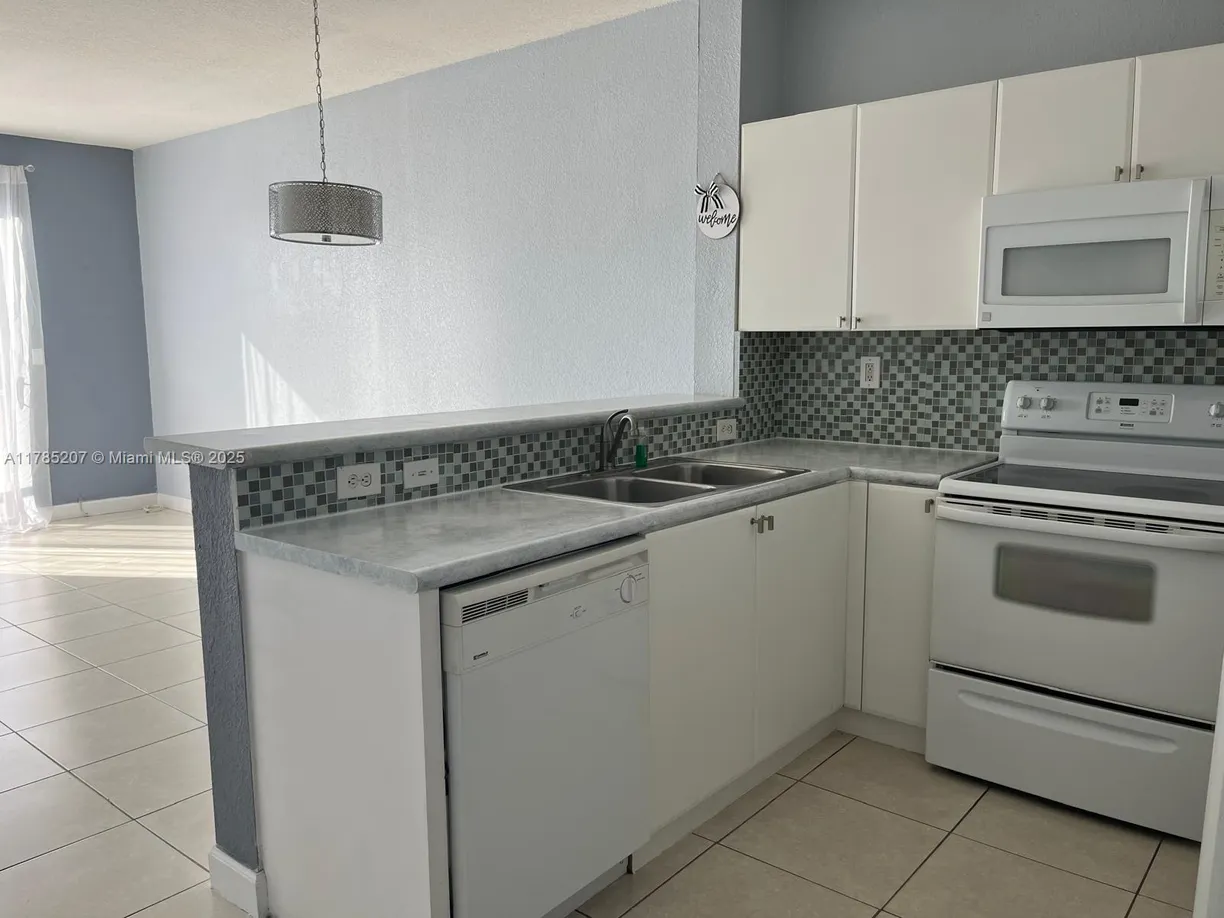 South Florida Real Estate | View 7100 NW 177th St, 204-14 | Listing