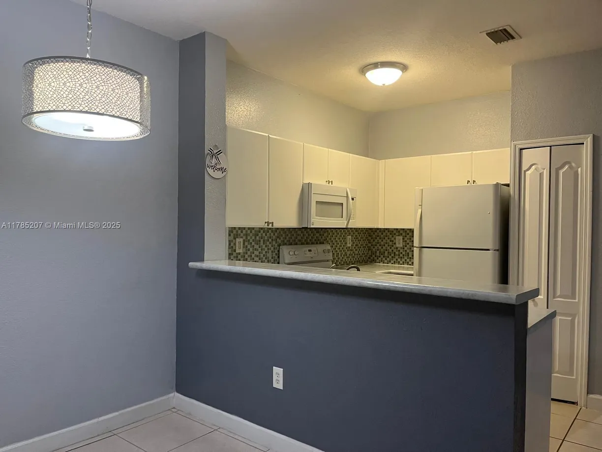 South Florida Real Estate | View 7100 NW 177th St, 204-14 | Listing