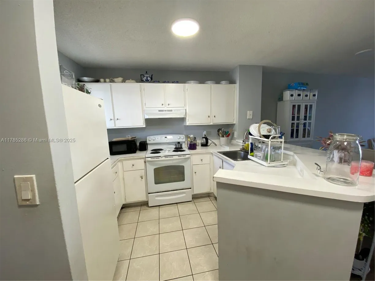 South Florida Real Estate | View 8710 N Sherman Cir, 202 | Listing