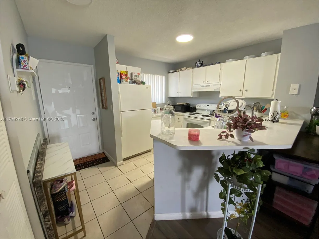 South Florida Real Estate | View 8710 N Sherman Cir, 202 | 2 Beds, 2 Baths
