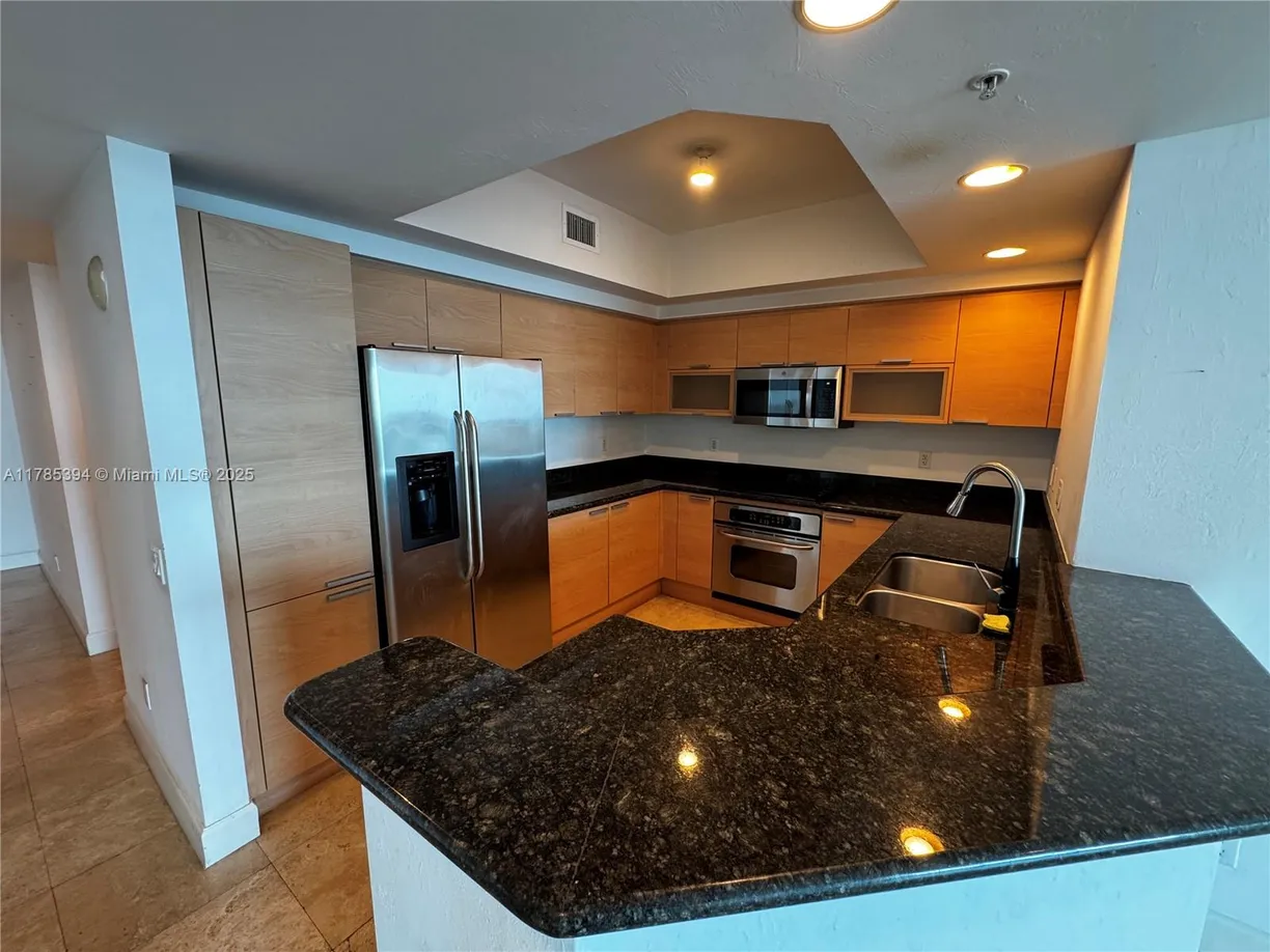 South Florida Real Estate | View 14951 Royal Oaks Ln, 1504 | Listing