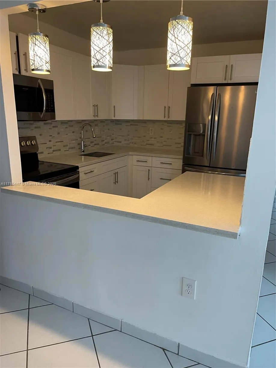 South Florida Real Estate | View 5201 NW 7th St, 317 | 2 Beds, 2 Baths